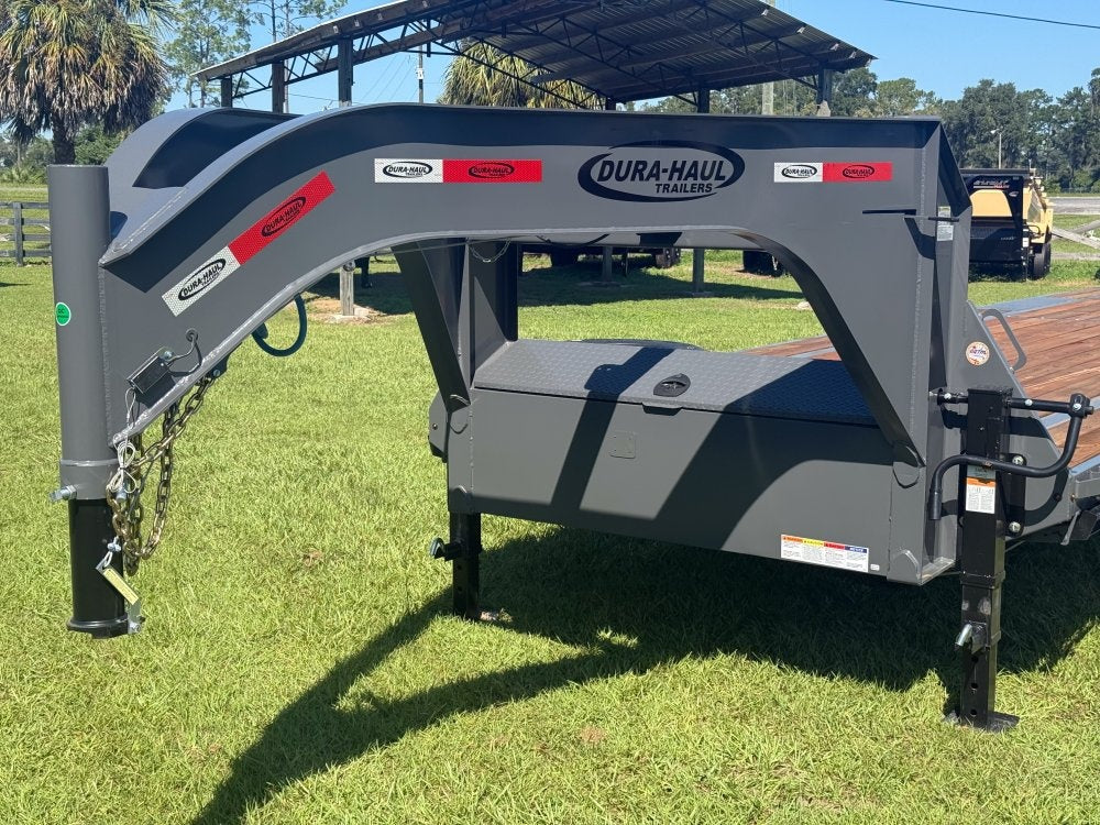 Mega ramps deployed on 40-foot gooseneck flatbed trailer